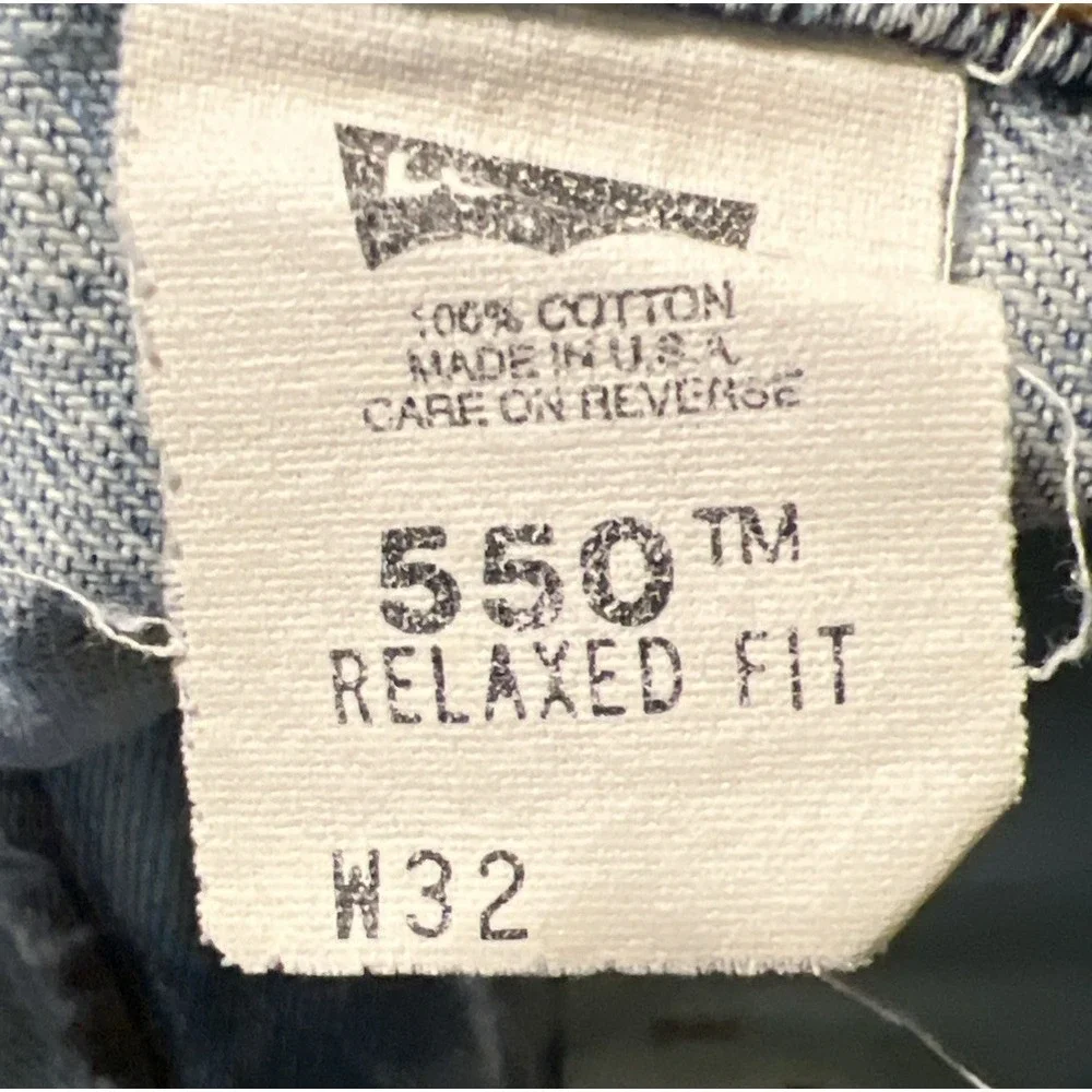 Vintage Levi's 550 Heavily Distressed Light Wash Blue Jean Shorts Size 32x10 USA